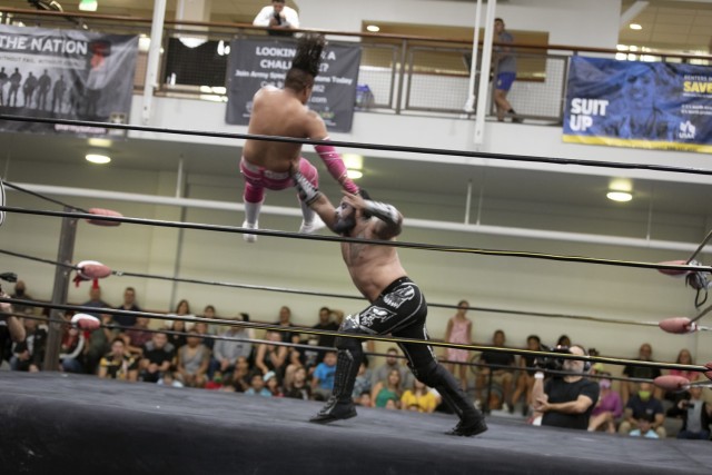 High-flying luchadores grapple at the Sgt. Joshua W. Soto Physical Fitness Center at Fort Bliss, Texas, July 23, 2021. Fort Bliss FMWR invited Lucha Frontera, a regional Lucha Libre wrestling production, on post for a free show for Bliss Soldiers, civilians, and their families and guests.