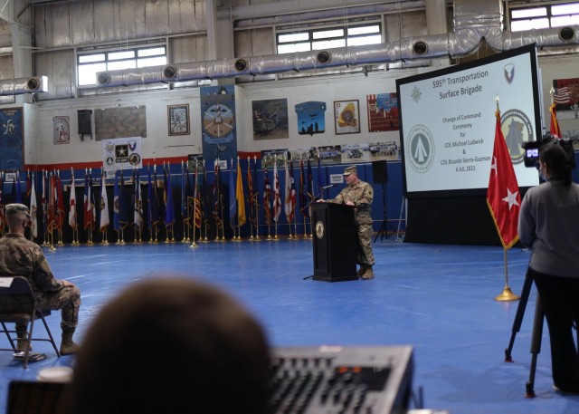 The outgoing commander of the 595th Transportation Brigade (SDDC), Col. Michael E. Ludwick, told his troops and guests at the brigade's July 6, 2021 change of command ceremony held at Camp Arifjan, Kuwait, that all of his accomplishments during his tour were because of his 595th and Military Surface Deployment and Distribution Command family. Ludwick relinquished command to Col. Ricardo L. Sierra-Guzman, whose most recent assignment was as the executive officer for the Fort Bragg, N.C., based 3rd Sustainment Command (Expeditionary). (U.S. Army photo by Staff Sgt. Neil W. McCabe)