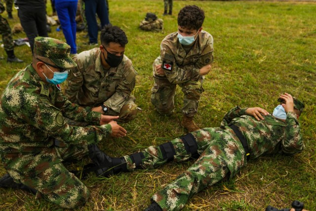 U.S. Army 82nd Airborne Division medics and two Colombian army combat medics conduct medical evacuation rehearsals July 24, 2021, at Tolemaida Air Base, Colombia. The U.S. Army and Colombian military conducted a Dynamic Force Employment airborne exercise, also known as Exercise Hidra II, involving jungle and water survival training, multiple airborne jumps and a field training exercise. (U.S. Army photo by Pfc. Joshua Taeckens)