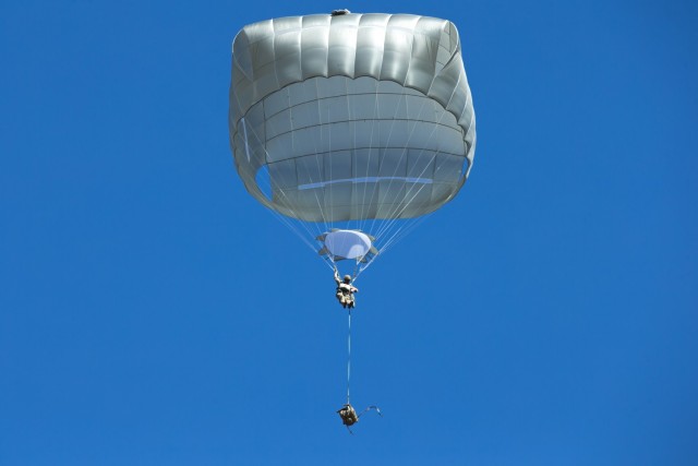 U.S. Army paratroopers with the 3rd Battalion, 509th Parachute Infantry Regiment, 4th Infantry Brigade Combat Team (Airborne), jump onto a drop zone as part of a simulated Joint Forcible Entry Operation during Exercise Talisman Sabre 21 in Charters Towers, Queensland, Australia, July 28, 2021. This event is part of a larger simulated JFEO overseen by the U.S. Army’s 4th Infantry Division Forward Command Post acting as the Combined Land Forces Component Command headquarters for this portion of TS21. TS21 supports the U.S. National Defense Strategy by enhancing the ability to protect the homeland and provide combat-credible forces to address the full range of potential security concerns in the Indo-Pacific. (U.S. Marine Corps photo by Lance Cpl. Alyssa Chuluda)
