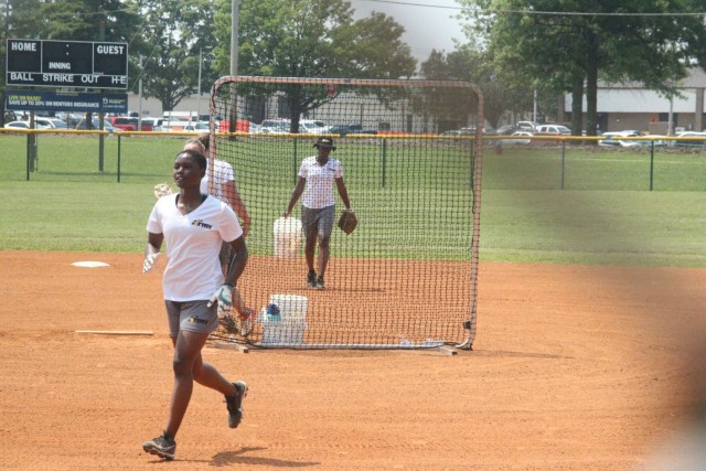 Specialist Nijah McCray, U.S. Army Medical Department Activity, Fort Leonard Wood, Mo., front; and Staff Sgt. Tammy Alexander, E Company, 1-52nd General Support Aviation Battalion, Fort Wainwright, Alaska, behind the screen; field hits July 23 at...