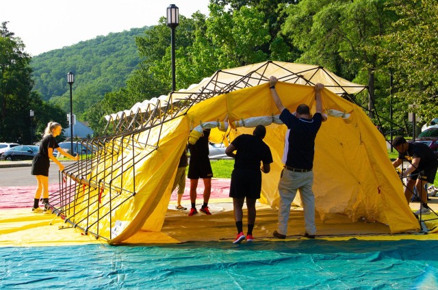 Cadets and staff members from Keller Army Community Hospital set up four triage tents during the mass casualty/decontamination exercise on July 22 at the U.S. Military Academy.