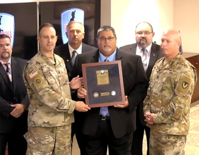 Mr. Gregory Babarsky (Project Team Leader) accepts the  2020 Lean Six Sigma Excellence Award for Process Improvement Non-Enterprise Level Black Belt Project on behalf of U.S. Army Materiel Command, Communication-Electronics Command, Tobyhanna Army Depot.