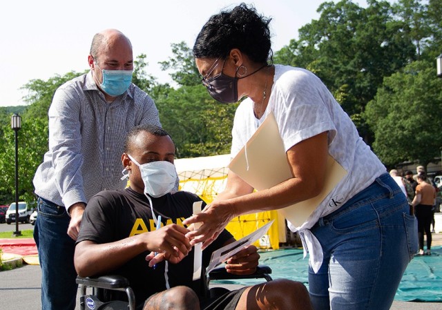 There were varying degrees of hypothetical injuries that medical practitioners assessed during the drill. There were 25 community members who volunteered as role players (left) and served as an integral part of the exercise.