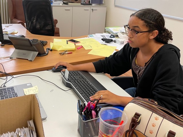 Kayla White creates purchase orders for the military police department on Caserma Ederle, in Vicenza, Italy, Thursday, July 22, 2021. The military police department on Caserma Ederle is a branch of the department of emergency services.
