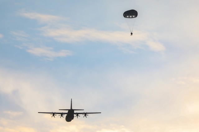 Soldiers from 1st Special Forces Group and members of the Japan Ground Self-Defense Forces Group, complete a joint airborne operation on Andersen Air Force Base, Guam, July 30, 2021. Exercise Forager 21 is designed to test and refine the multi-domain capabilities with our allies in the Indo-Pacific theatre. (U.S. Army photo by Staff Sgt. Effie Mahugh, 28th Public Affairs Detachment)