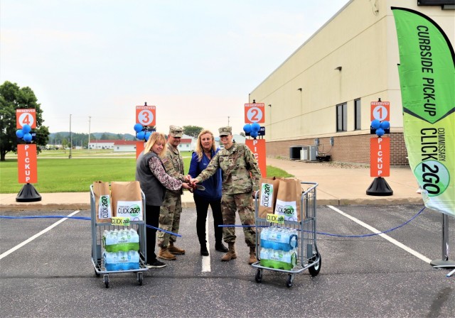 Fort McCoy Commissary Accounting Technician Kathy Minich, Garrison Deputy Commander Lt. Chad Maynard, Commissary Store Manager Kim Graham, and Command Sgt. Maj. Raquel DiDomenico, garrison command sergeant major, officially cut a ribbon July 26,...