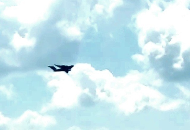 A C-17 Globemaster III soars through the sky Aug. 1, 2021, after taking off from Sparta-Fort McCoy Airport at Fort McCoy, Wis.The C-17 Globemaster III is the most flexible cargo aircraft to enter the airlift force for the U.S. Air Force,...