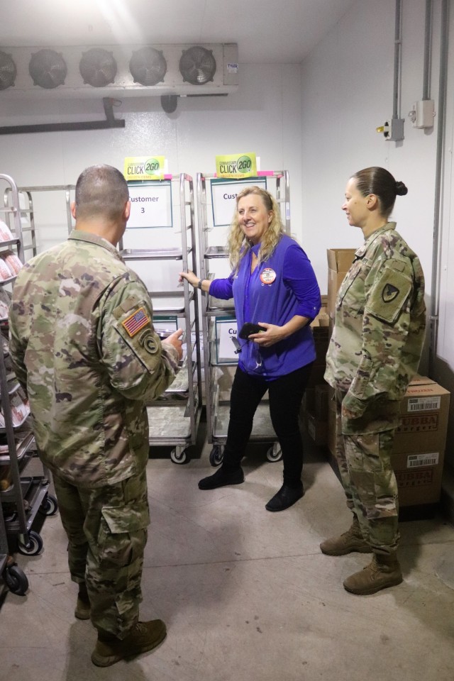 Fort McCoy Commissary Store Manager Kim Graham demonstrates how to fill an order July 26, 2021, for the CLICK2GO online ordering and curbside service at the Fort McCoy Commissary at Fort McCoy, Wis. The Fort McCoy Commissary began using the...