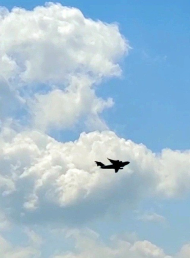A C-17 Globemaster III soars through the sky Aug. 1, 2021, after taking off from Sparta-Fort McCoy Airport at Fort McCoy, Wis.The C-17 Globemaster III is the most flexible cargo aircraft to enter the airlift force for the U.S. Air Force,...