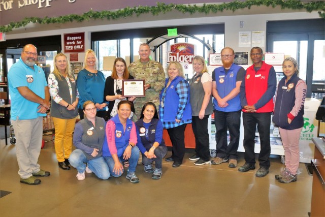 Members of the Fort McCoy Commissary team receive a certificate of appreciation July 27, 2021, from Garrison Commander Col. Michael Poss and Sexual Assault Response Coordinator Rebecca Wilkinson with the Directorate of Family and Morale, Welfare...
