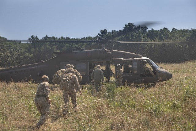 The Royal Air Force and the 3rd Assault Helicopter Battalion, 1st Aviation Regiment, 1st Combat Aviation Brigade, 1st Infantry Division, partnered to conduct a Joint Personnel Recovery exercise July 26, 2021, at MK Air Base, Romania. In this...
