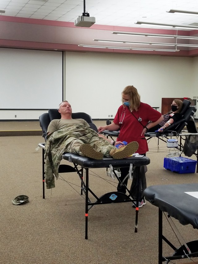 A Soldier gives blood July 16 at an American Red Cross blood drive at Fort McCoy. Wisconsin is facing a blood shortage, and eligible donors are asked to give. For donation guidelines and upcoming drives, visit www.redcrossblood.org.