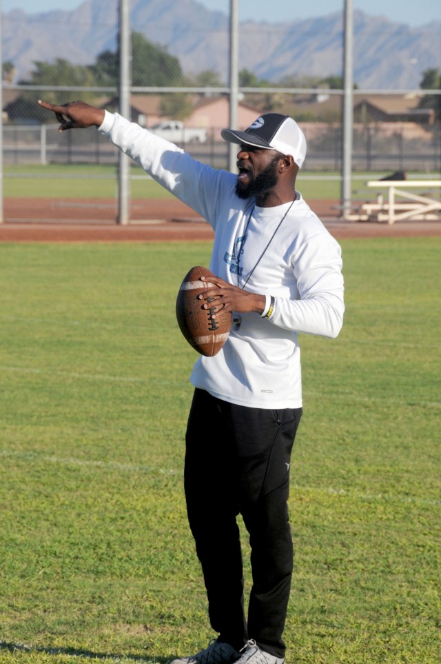 U.S. Army Yuma Proving Ground antiterrorism officer Alfonso Brown serves as a volunteer coach for the varsity football squad at Gila Ridge High School in Yuma. Brown believes that playing youth sports helped him in his later life. “Playing...