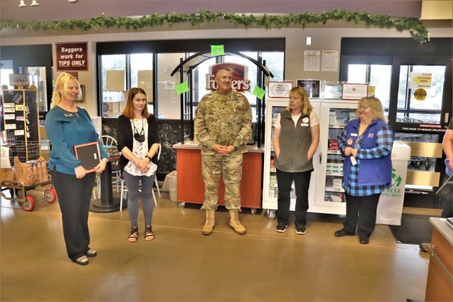 Members of the Fort McCoy Commissary team listen in as they receive a certificate of appreciation July 27, 2021, from Garrison Commander Col. Michael Poss and Sexual Assault Response Coordinator Rebecca Wilkinson with the Directorate of Family and...