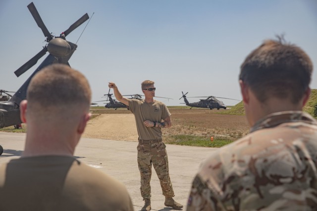 The Royal Air Force and the 3rd Assault Helicopter Battalion, 1st Aviation Regiment, 1st Combat Aviation Brigade, 1st Infantry Division,  partnered to conduct a Joint Personnel Recovery exercise July 26, 2021, at MK Air Base, Romania. U.S. Army...