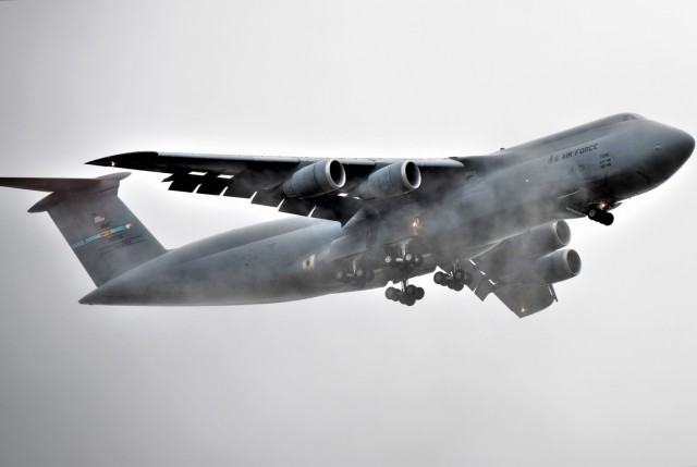 An Air Force C-5M Super Galaxy and aircrew from Dover Air Force Base, Del., carrying Soldiers with the 3rd Brigade Combat Team, 10th Mountain Division of Fort Polk, La., prepare to land July 7, 2021, as part of an Emergency Deployment Readiness...