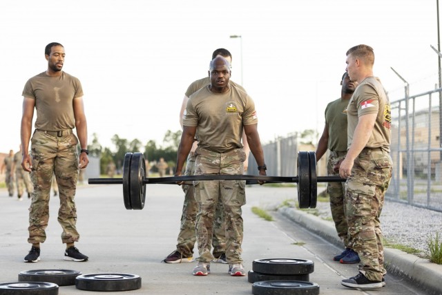 A Spartan Soldier from D Company, 6th Squadron, 8th Cavalry Regiment, 2nd Armored Brigade Combat Team, participates in the deadlift chipper lane part of the larger Iron Spartan competition on Fort Stewart, Georgia, June, 25 2021. The comprehensive, timed competition sought to build a team inside a team in company formations, demonstrate the physical capability of an armored brigade combat team, and show that “People First” really means preparing Soldiers to fight, win, and come home from the nation’s wars through tough, realistic training. (U.S. Army Photo by Spc. Robert P Wormley III, 50th Public Affairs Detachment)