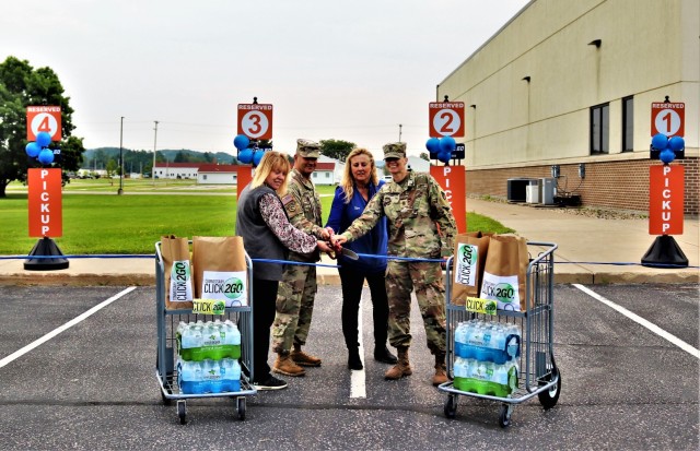 Fort McCoy Commissary Accounting Technician Kathy Minich, Garrison Deputy Commander Lt. Chad Maynard, Commissary Store Manager Kim Graham, and Command Sgt. Maj. Raquel DiDomenico, garrison command sergeant major, officially cut a ribbon July 26,...