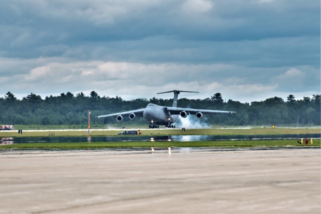 An Air Force C-5M Super Galaxy from Dover Air Force Base, Del., carrying Soldiers with the 3rd Brigade Combat Team, 10th Mountain Division of Fort Polk, La., lands July 7, 2021, as part of an Emergency Deployment Readiness Exercise (EDRE) at Volk...
