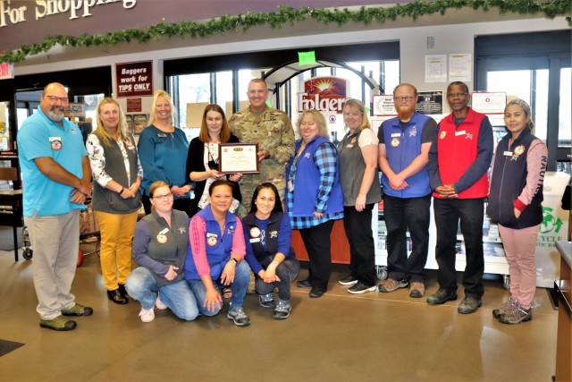 Members of the Fort McCoy Commissary team receive a certificate of appreciation July 27, 2021, from Garrison Commander Col. Michael Poss and Sexual Assault Response Coordinator Rebecca Wilkinson with the Directorate of Family and Morale, Welfare...
