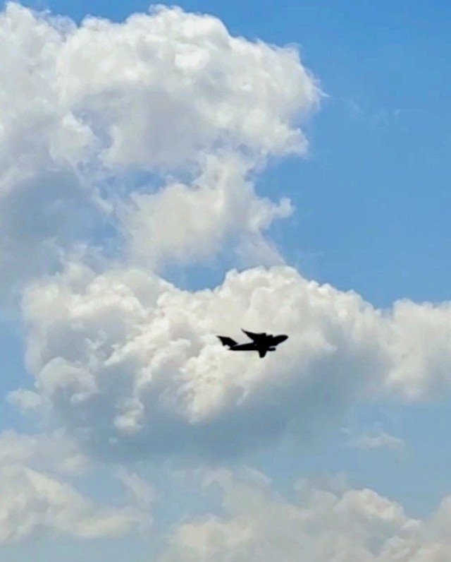 A C-17 Globemaster III soars through the sky Aug. 1, 2021, after taking off from Sparta-Fort McCoy Airport at Fort McCoy, Wis.The C-17 Globemaster III is the most flexible cargo aircraft to enter the airlift force for the U.S. Air Force,...