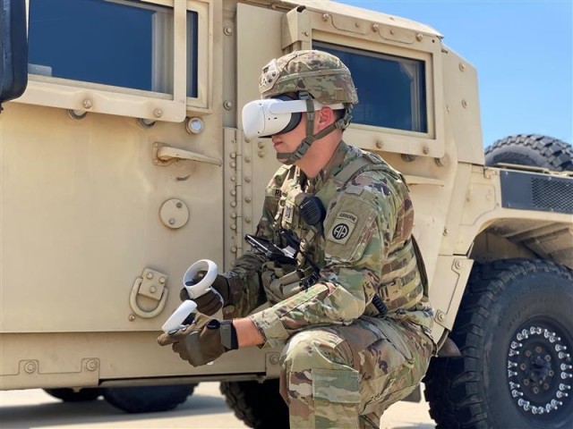 A U.S. Army Soldier conducts a quick halt to drop into the XR-Common Operating Picture (COP) virtual reality environment to conduct a terrain fly through before conducting a mission. 
