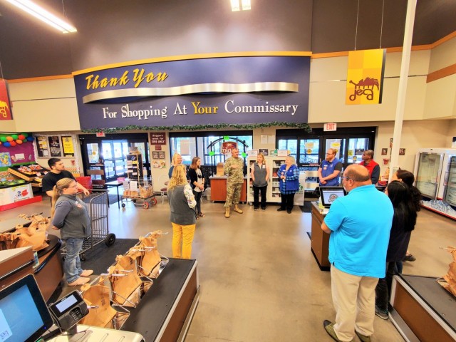 Members of the Fort McCoy Commissary team listen in as they receive a certificate of appreciation July 27, 2021, from Garrison Commander Col. Michael Poss and Sexual Assault Response Coordinator Rebecca Wilkinson with the Directorate of Family and...