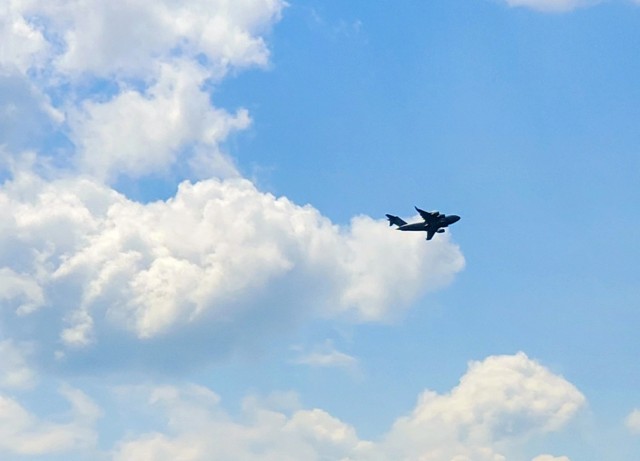 A C-17 Globemaster III soars through the sky Aug. 1, 2021, after taking off from Sparta-Fort McCoy Airport at Fort McCoy, Wis.The C-17 Globemaster III is the most flexible cargo aircraft to enter the airlift force for the U.S. Air Force,...