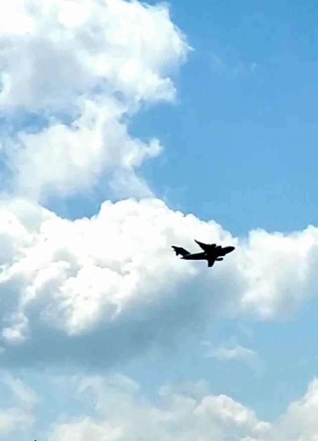 A C-17 Globemaster III soars through the sky Aug. 1, 2021, after taking off from Sparta-Fort McCoy Airport at Fort McCoy, Wis.The C-17 Globemaster III is the most flexible cargo aircraft to enter the airlift force for the U.S. Air Force,...