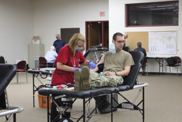 A Soldier gives blood July 16 at an American Red Cross blood drive at Fort McCoy. Wisconsin is facing a blood shortage, and eligible donors are asked to give. For donation guidelines and upcoming drives, visit www.redcrossblood.org.