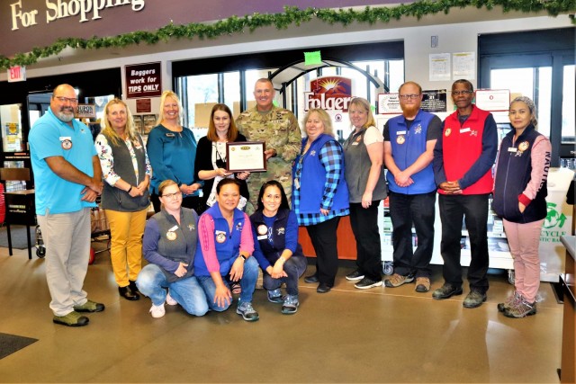 Members of the Fort McCoy Commissary team receive a certificate of appreciation July 27, 2021, from Garrison Commander Col. Michael Poss and Sexual Assault Response Coordinator Rebecca Wilkinson with the Directorate of Family and Morale, Welfare...