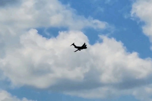 A C-17 Globemaster III soars through the sky Aug. 1, 2021, after taking off from Sparta-Fort McCoy Airport at Fort McCoy, Wis.The C-17 Globemaster III is the most flexible cargo aircraft to enter the airlift force for the U.S. Air Force,...