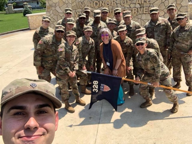 Soldiers who visited the Commemorative Area on July 17 take a photo with their tour guide Kaleen Holliday of the Fort McCoy Public Affairs Office at Veterans Memorial Plaza. (Contributed photo)