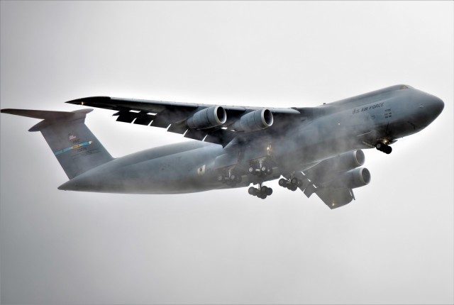 An Air Force C-5M Super Galaxy and aircrew from Dover Air Force Base, Del., carrying Soldiers with the 3rd Brigade Combat Team, 10th Mountain Division of Fort Polk, La., prepare to land July 7, 2021, as part of an Emergency Deployment Readiness...
