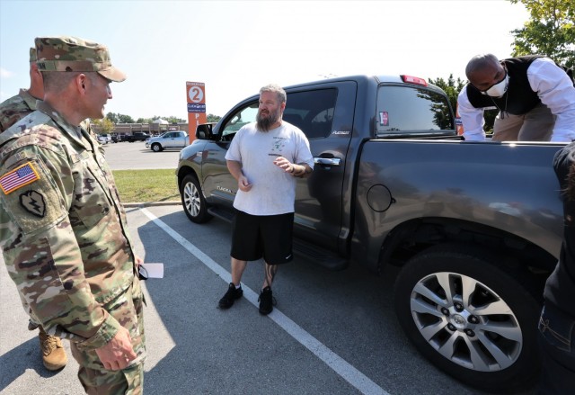Fort Knox Garrison Commander Col. Lance O’Bryan discusses the experience of using the CLICK2GO system with the first Fort Knox CLICK2GO customer, William Armstrong. “It was so easy,” said Armstrong.