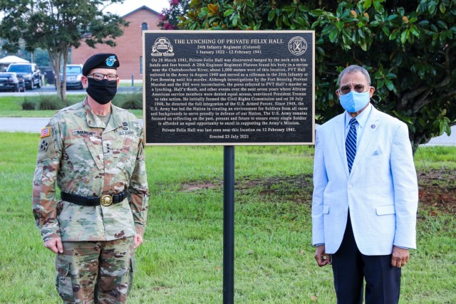 FORT BENNING, Ga - Lt. Gen. Theodore D. Martin, Deputy Commanding General/Chief of Staff, U.S. Army Training and Doctrine Command and congressman Sanford D. Bishop, 2nd Congressional District, Georgia, unveiled a historic marker honoring Pvt. Felix Hall August, 3, 2021 on Post.  Pvt. Hall, a 19-year-old black man from Alabama, had volunteered just a few months earlier. At Fort Benning, he was training for the possibility of fighting overseas in a unit of African American soldiers.  (U.S. Army photo by Markeith Horace, Fort Benning Maneuver Center of Excellence photographer)