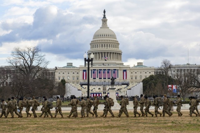 National Guard Soldiers provide security outside the U.S. Capitol during the 59th Presidential Inauguration Jan. 20, 2021, as part of the National Guard’s Capitol Response security mission. More than 26,000 National Guard members from all states...