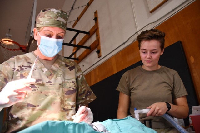 U.S. Army Reserve Maj. Emilee Alms, a veterinarian with the 7351st VET Detachment, 7214 Medical Support Unit and an Arden Hills, Minn. resident, conducts a spay surgery on a kitten assisted by U.S. Army Reserve Spc. Jayden Vergara, an animal care specialist with the 7351 VET Detachment and a Logan, Utah native.
The 7214th MSU was conducting Innovative Readiness Training in support of Operation Walking Shield, a program that teams federal agencies with American Indian groups to help improve living conditions on American Indian reservations. Innovative Readiness Training is an opportunity that provides training for our military personnel to ensure deployment readiness while addressing needs within America’s local communities.
For this IRT project, 35 U.S. Army Reserve Soldiers assigned to Army Reserve Medical Command’s 7214th MSU based in Garden Grove, California in partnership with the Fort Belknap Agency and Hays Clinic, offered health care services at the Fort Belknap Agency and Hays Clinic on the Fort Belknap Reservation, Montana from July 18-31. The project supported a tribal population of more than 5,800 people. 
The medical professionals supporting this mission included physicians, physician assistants, nurses, a psychologist, a behavioral health technician, a pharmacist and pharmacy technician, dentists, dental assistants, medics and several support staff.  
Medical services provided included general medicine, health exams, behavioral health, dental exams and services, veterinary services, public education and other health care services.