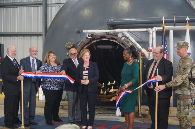 Pictured from left to right: Ed Averill, deputy to the commander, Letterkenny Munitions Center; Jeffrey Wright, program manager, Aviation and Missile Command Demilitarization; JoEtta Fisher, executive director for ammunition/deputy to the commande, Joint Munitions Command. John Figueroa, product director demilitarization, Program Executive Office Ammunition; Lisha Adams, executive deputy to the commanding general, Army Materiel Command; Mariane Guidrey, program manager, AMCOM Demilitarization;  Woody Pike, project manager, LEMC; Lt. Col. Timothy Ballas, LEMC commander cut the ribbon at the Ammonium Perchlorate Rocket Motor Destruction facility July 29 