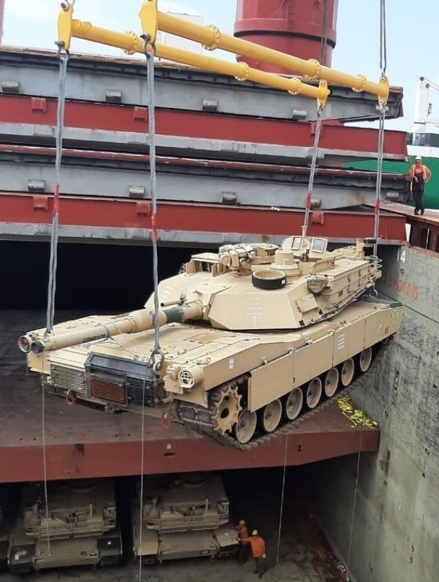 U.S. Army photo by Andre Cameron. An M1A2 tank assigned to the 1st Armored Brigade Combat Team, 1st Infantry
Division arrives at the port facility in Alexandroupoli, Greece, July 20,
2021. This the first time the U.S. Army has deployed tanks, Bradley Fighting
Vehicles and other tracked equipment through the port. The 1st ABCT is
arriving for its nine-month deployment to the European theater in support of
Atlantic Resolve.