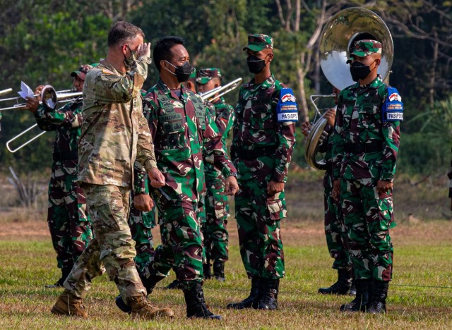 U.S. Army Gen. Charles Flynn, commanding general of the U.S. Army Pacific, and Gen. Andika Perkasa, Chief of Staff of the Indonesian Army, stand together during the opening ceremony for Garuda Shield 21 at the Baturaja Training Area, on August 4, 2021. Garuda Shield 21 is a two-week joint-exercise between the United States Army and Tentara Nasional Indonesia (TNI-AD Indonesia Armed Forces). The purpose of this joint-exercise is to enhance and enrich the jungle warfare ability of both the U.S. Army and Indonesian Army.  (U.S. Army photo by Spc. Joshua Oller)