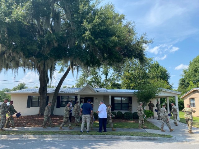 Hunter Army Airfield leaders tour legacy housing in Wilson Acres during a walking town hall, July 30. During this tour, Balfour Beatty and Military Housing representatives provided information on quality of life, service requests, common complaints and more.