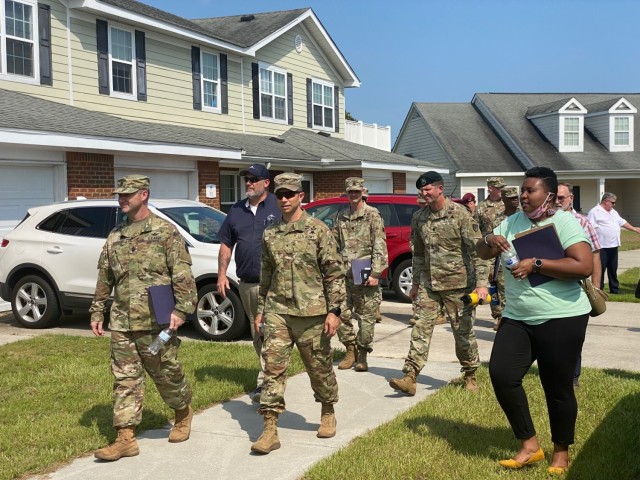 Hunter Army Airfield leadership, along with Balfour Beatty Communities, tour the New Gannam housing area during a walking town hall, July 30.