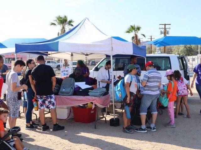 School Aged Kids receive free backpacks at the back to school bash