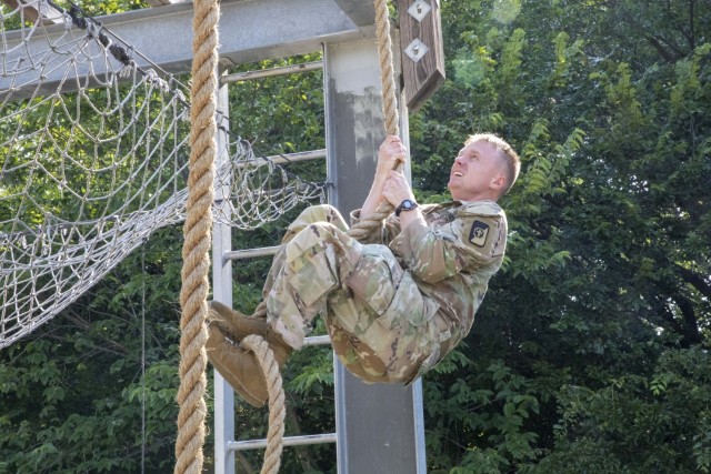 U.S. Army Spc. James Maynes, a Soldier with I Corps, participates in the Obstacle Course event during the 2021 FORSCOM Best Warrior Competition, August 2, 2021, at Fort Riley, Kansas. Thirteen noncommissioned officers and twelve junior enlisted...