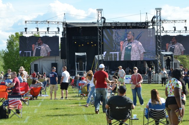 Comedian Ronnie Jordan warms up the crowd with a quick comedy show before Fort Wainwright's summer concert June 5. The outdoor concert featured performances by rapper and movie star Chris "Ludacris" Bridges, country singer Brantley Gilbert, and Jordan. (Photo by Eve Baker, Fort Wainwright Public Affairs Office)