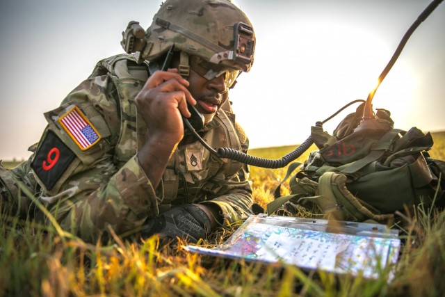 U.S. Army Staff Sgt. Asheil Allen, a noncommissioned assigned to the National Training Center, calls for fire while conducting Individual Movement Techniques (IMT) during the 2021 FORSCOM Best Warrior Competition at, Aug. 3, 2021, Fort Riley,...