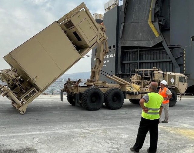U.S. Army civilians and host-nation transportation professionals from the 839th Transportation Battalion, Black Sea (Turkey) Detachment, oversee the download of Army equipment at the port facility in Izmir, Turkey, August 6, 2021. Following initial staging, the equipment will execute onward movement to training areas in Turkey in support of the exercise Dynamic Front 21.
