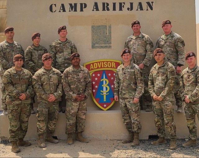 Soldiers assigned to 1st Battalion, 3rd Security Force Assistance Brigade stand for a group photo at Camp Arifjan, Kuwait.  The 3rd SFAB conducts worldwide security force assistance operations at the operational and tactical level to help develop the capacity and capability of foreign security forces. (Courtesy photo)